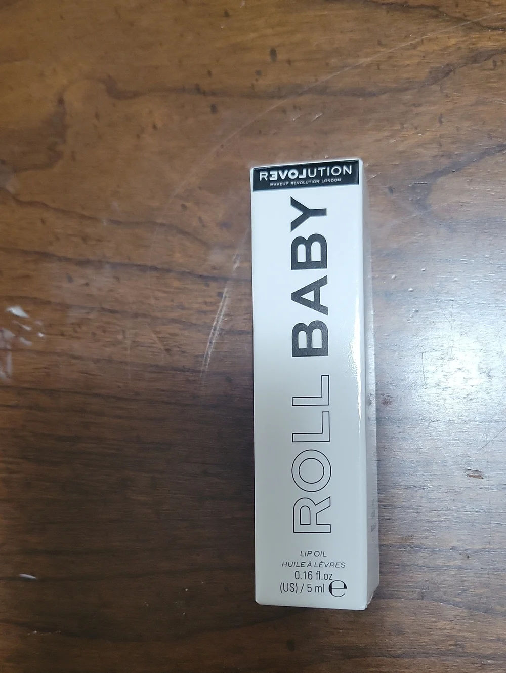 Revolution Roll Baby Lip oil clear
